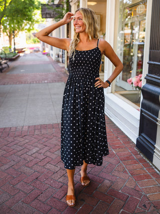 Polka dot smocked midi dress