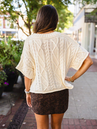 Drop shoulder cable knit sweater
