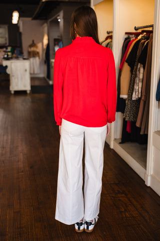 Red ruffle trim blouse